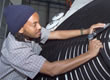 Picture of an FSEC employee testing a solar thermal collector.