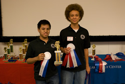 Photograph of  Titan I Rocket with trophy and ribbons.