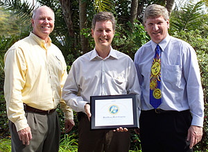 Photo of (left to right) Tom Hopkins, Walt Disney; Paul Allen, Reedy Creek; Jim Fenton, FSEC.