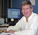 photo of Dr. James Fenton sitting at desk