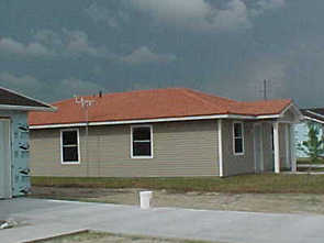 Terra cotta s-tile roof home