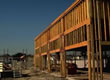 Picture of a woodframe house under construction.